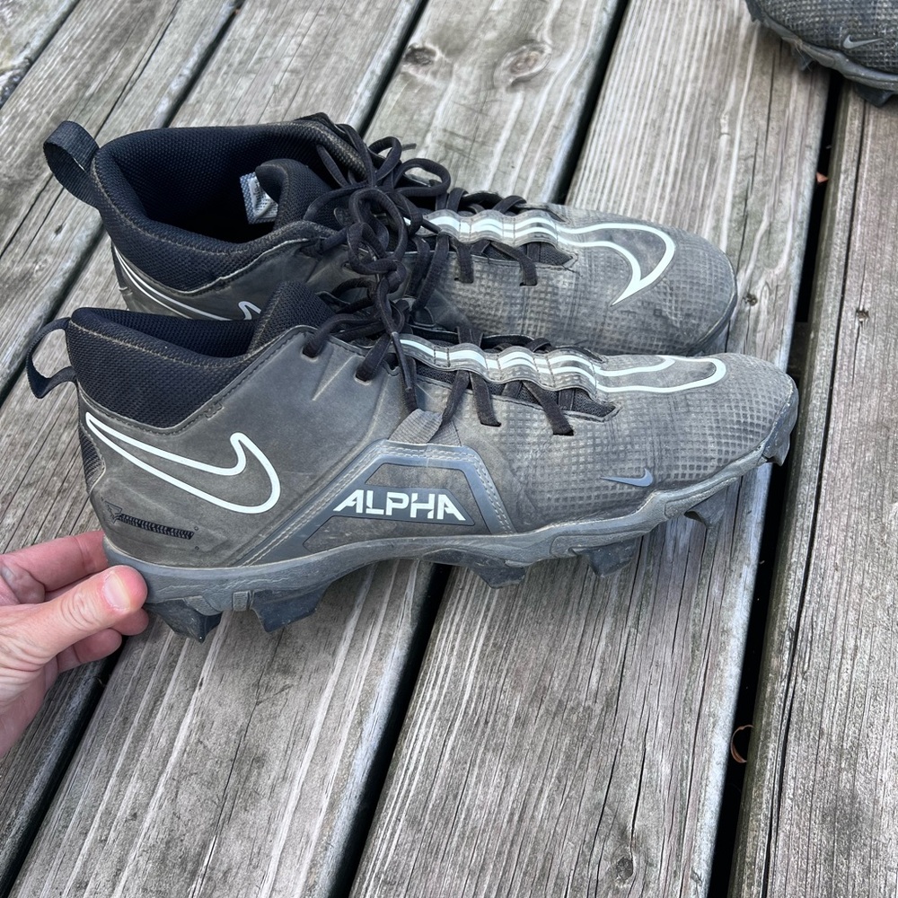Mens size 11 Nike Alpha cleats, worn one season.